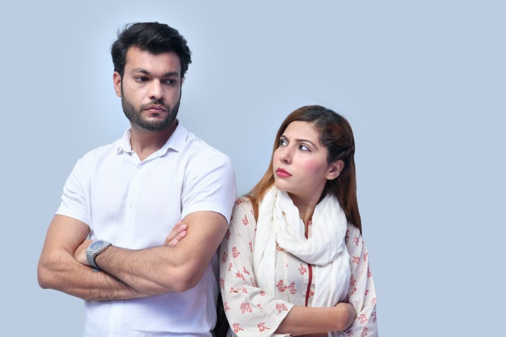 a man and woman posing for a picture