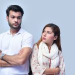 a man and woman posing for a picture